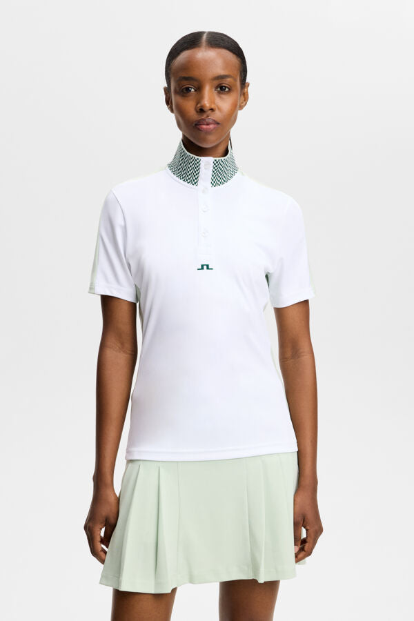 J.Lindeberg Pip Polo White – front view showing jacquard collar and button placket